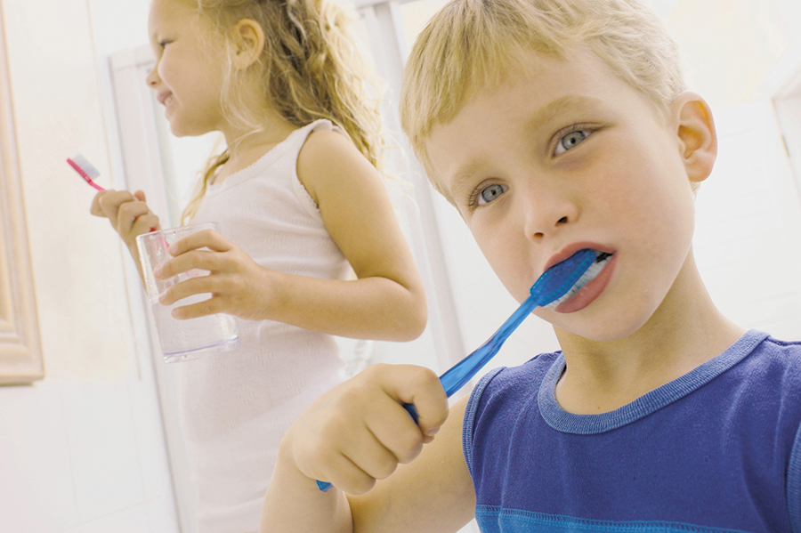 Kids brushing teeth